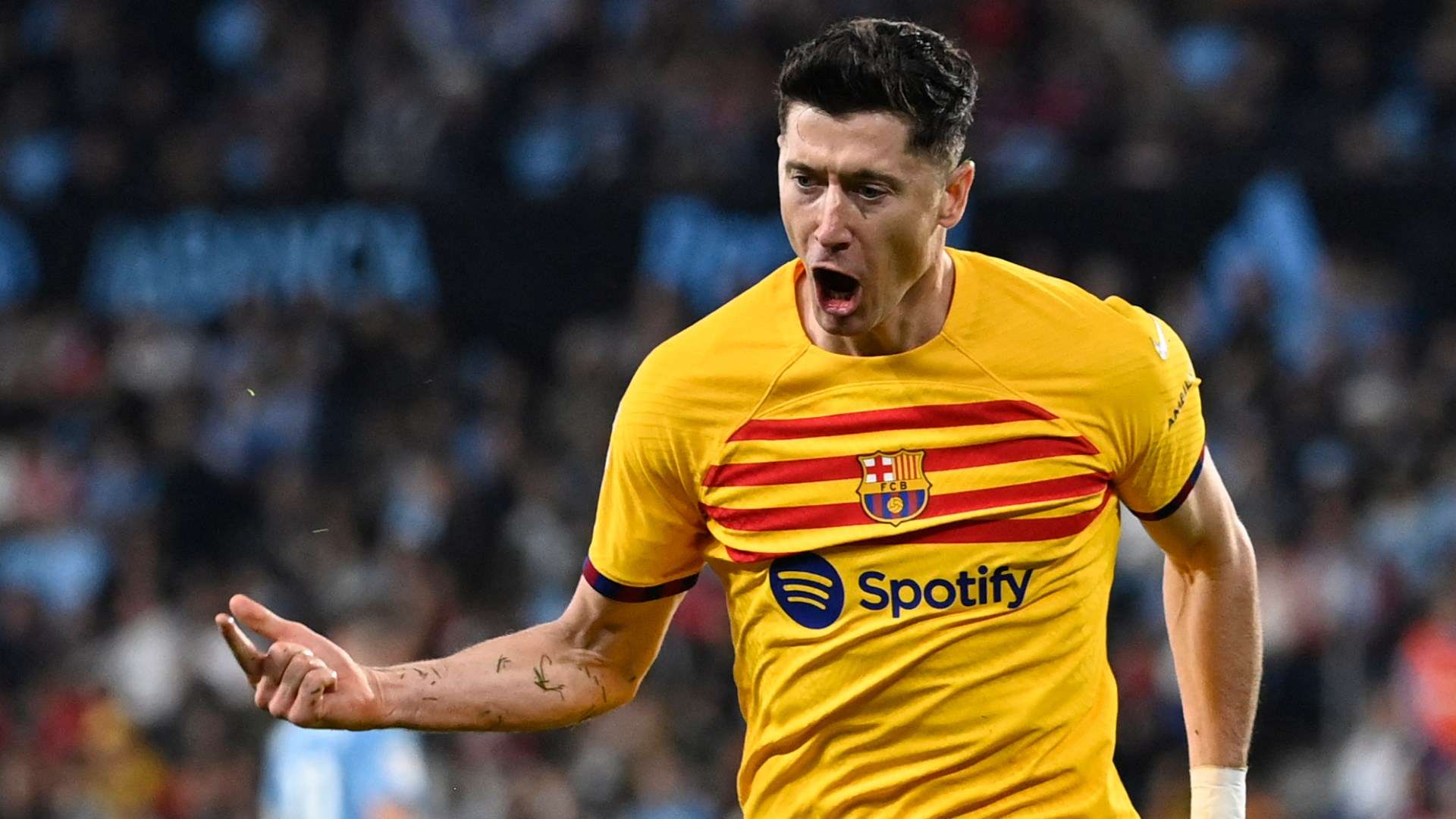 Robert Lewandowski celebrates his goal for Barcelona against Celta Vigo 2023-24