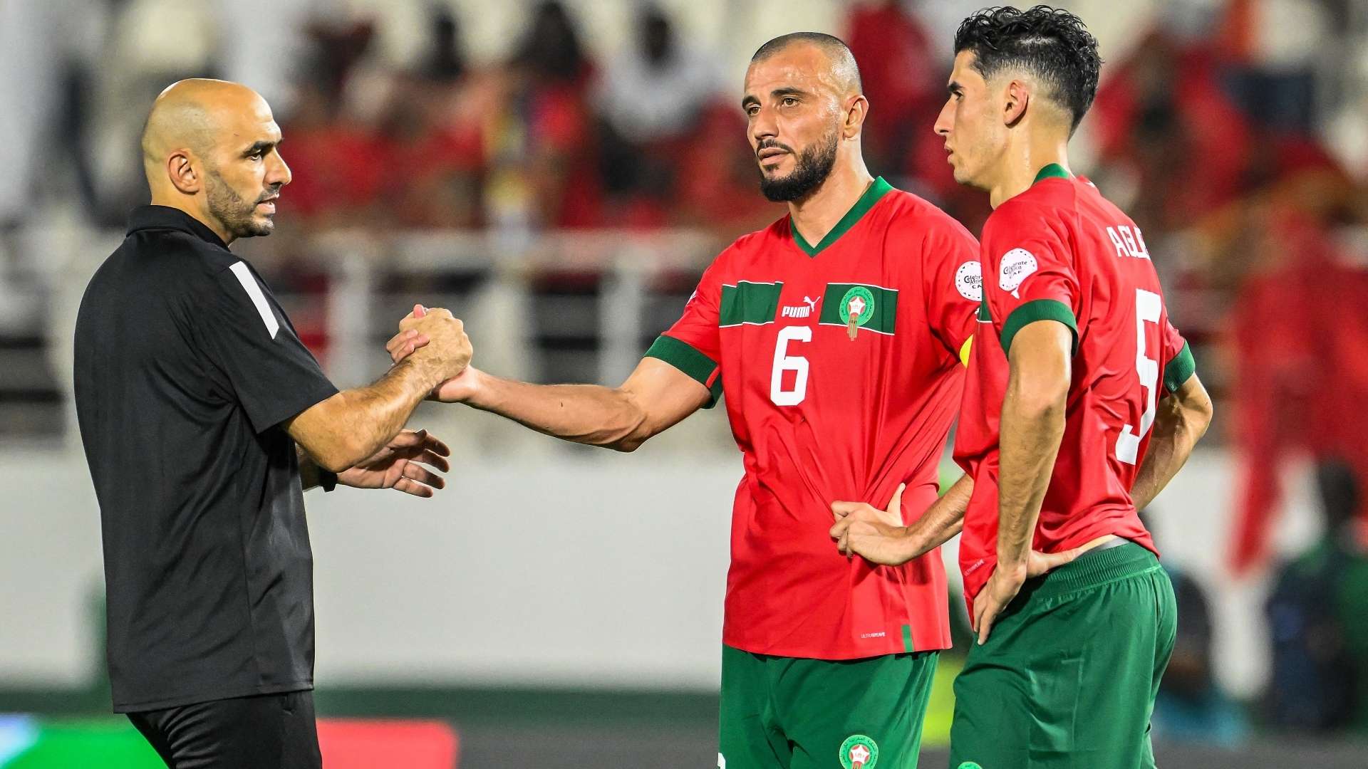 Walid Regragui, Romain Saiss and Nayef Aguerd, Morocco